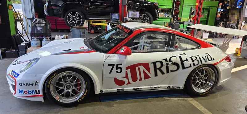 The Japan Cup 997 GT3 Cup car in the bays