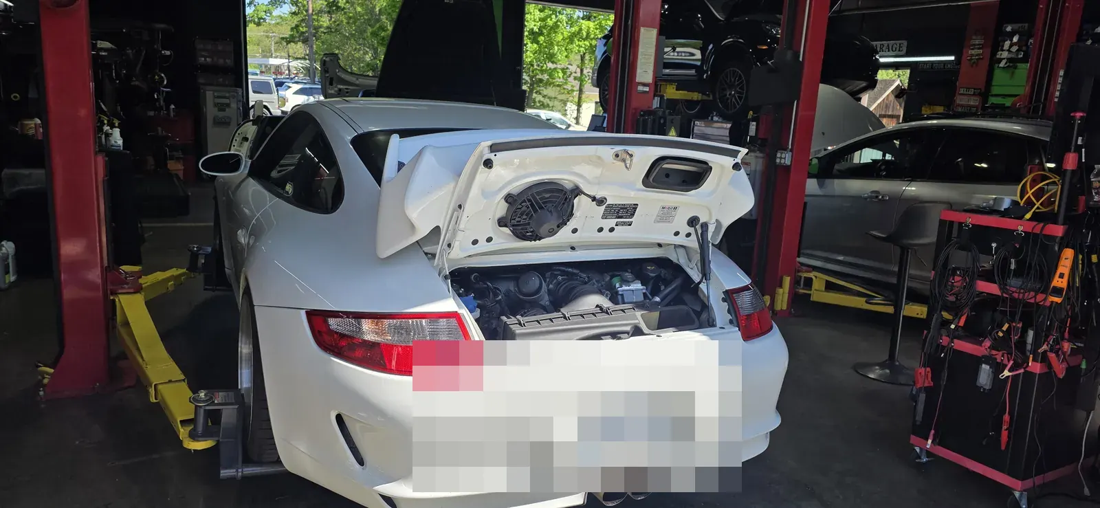 Porsche 997 GT3 decklid open for inspection at Prestige Performance Center