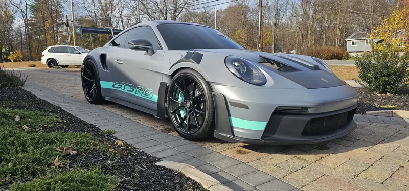 Customer 992 GT3 RS at the shop entrance