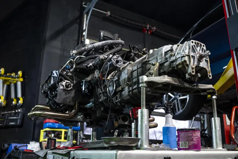 Air-cooled 993 flat-six and transaxle on the build stand