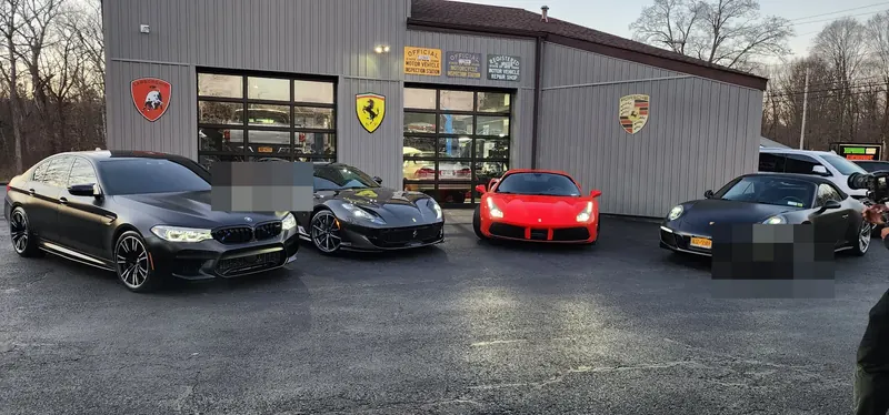 BMW M5, Ferrari 812 GTS, Ferrari 488, and Porsche 911 lined up out front
