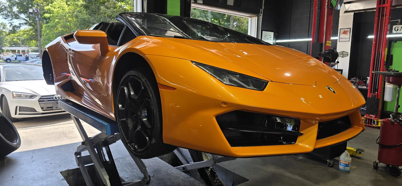 Lamborghini Huracan Spyder on the lift for performance work