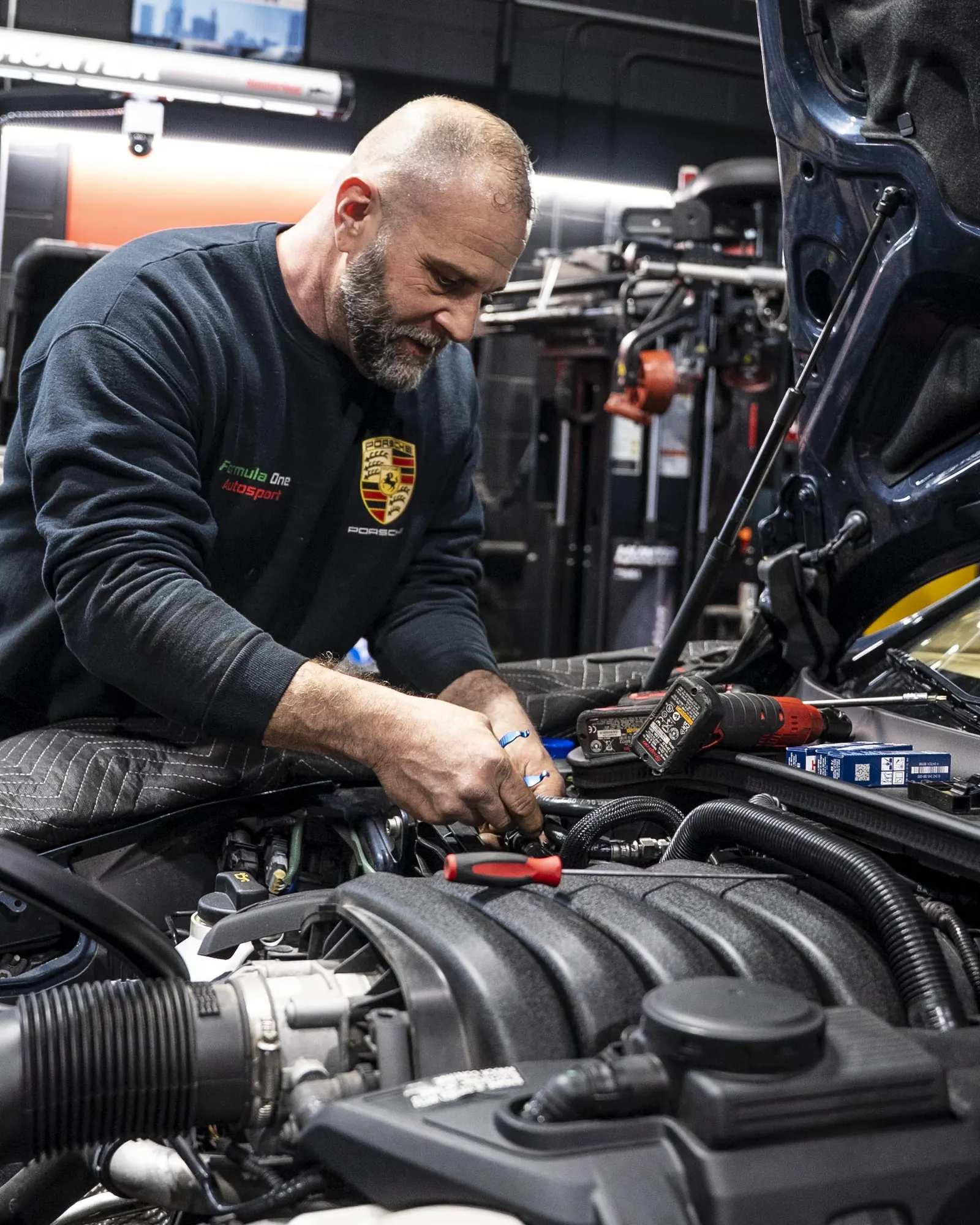 Scheduled maintenance service in the bay at Prestige Performance Center